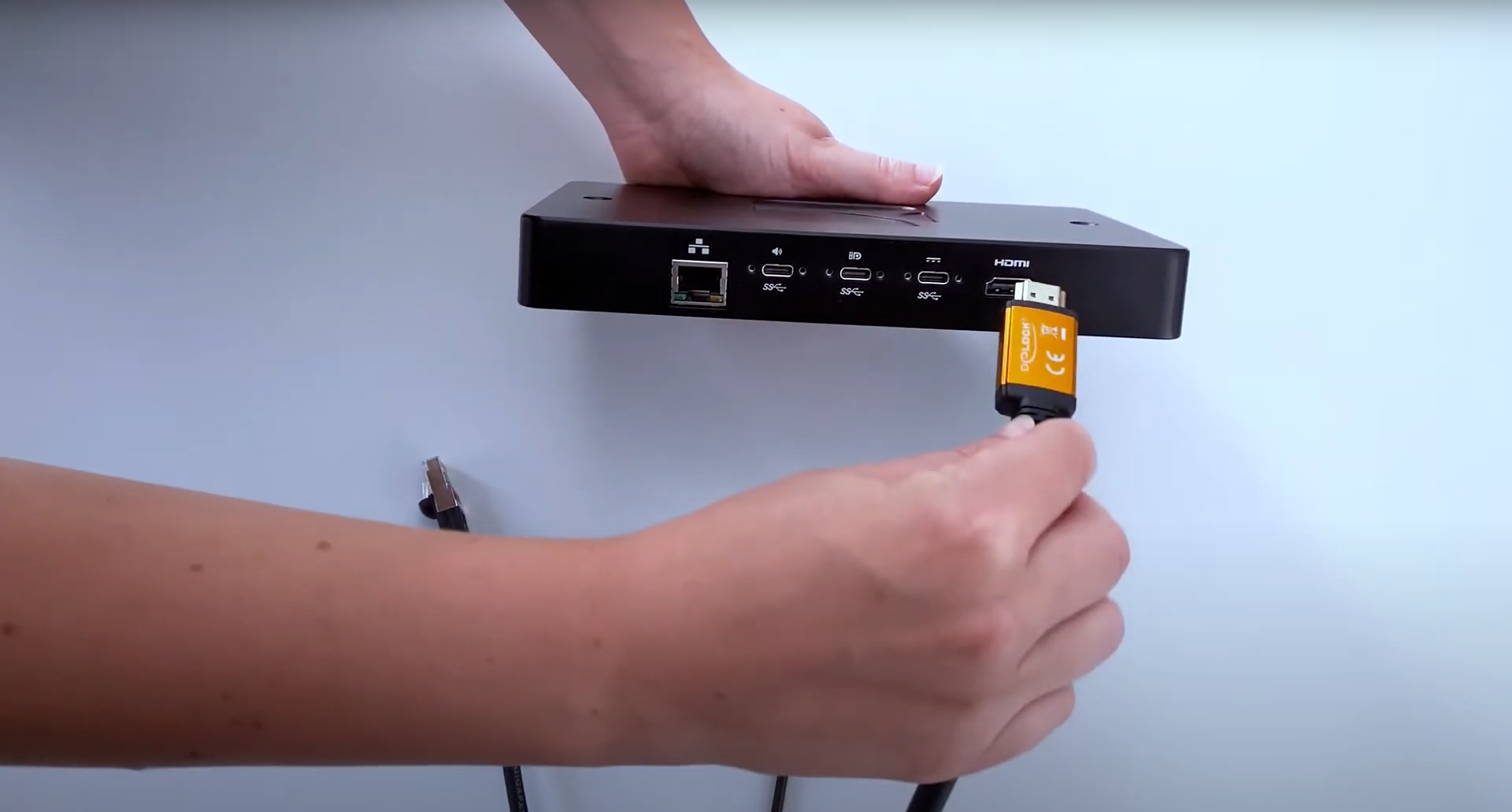 hdmi cable being connected to a SpinetiX HMP digital signage player