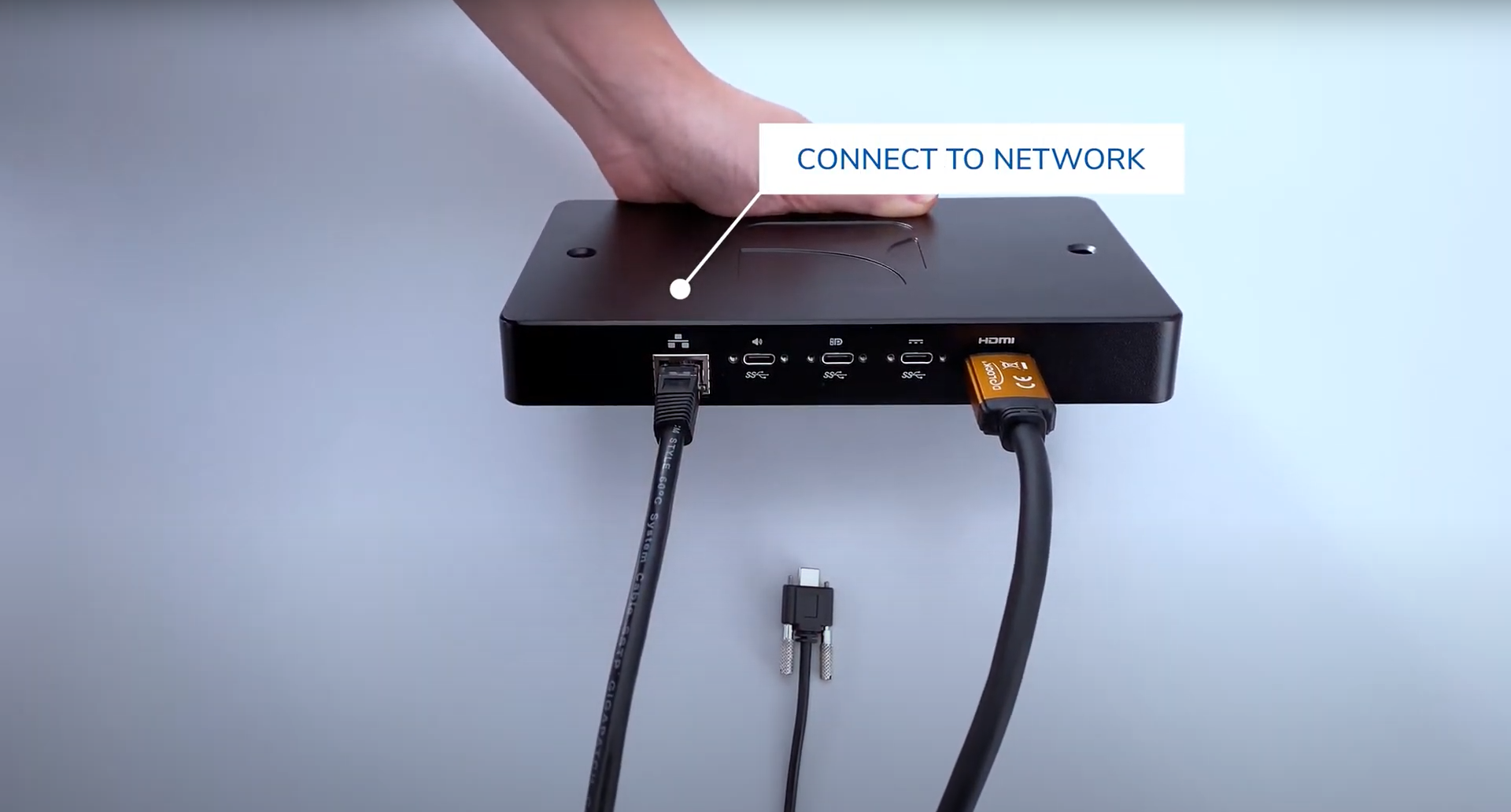 ethernet cable being connected to a SpinetiX HMP digital signage player